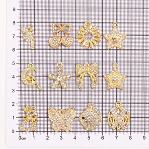 12er Set vergoldete Anhänger mit Strasssteinen Schmetterling Stern und Hase für DIY