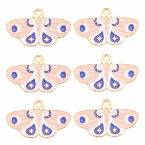 Détail de 6 pendentifs papillon dorés avec motifs célestes de lune et d'étoiles en émail