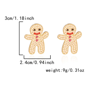 Dimensions détaillées des boucles d'oreilles bonhomme pain d'épice avec perles et cristaux