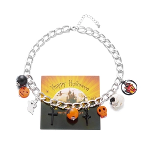 Halloween multi-charm silver chain bracelet featuring pumpkin ghost and skull pendants