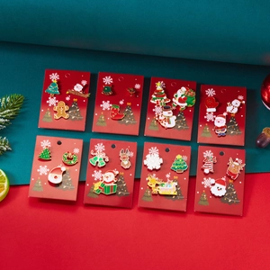 Set mit 8 festlichen Emaille-Anstecknadeln mit Rentier- und Weihnachtsmann-Motiven