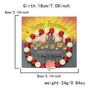 Detailed view of Halloween beaded bracelet with ghost pendant and measurement markers