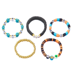 5-piece Halloween beaded bracelet set with skulls, pumpkins and BOO letter charms