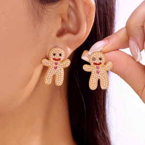 Boucles d'oreilles bonhomme en pain d'épices avec perles blanches et fini doré