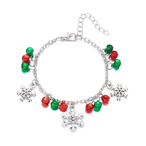 Detail of Christmas charm bracelet with colorful bells and sparkling snowflake pendants
