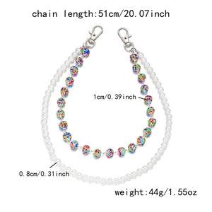 Detail of 51cm double-layer trousers chain with faux pearls and colorful crystal beads