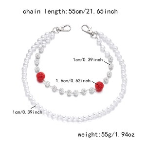 Detailed view of 55cm hip-hop pants chain with faux pearls, crystal beads, and lobster clasps