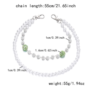 Detail of 55cm double-layer chain with white pearls and green rhinestone balls