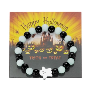 Halloween ghost charm bracelet with black and luminous beads on festive display card