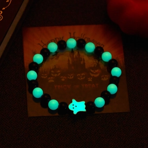 Luminous Halloween beaded bracelet with a glow-in-the-dark ghost charm in the dark