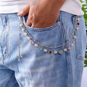 Detail of multilayer hip-hop waist chain with colorful crystal hearts and cross pendant