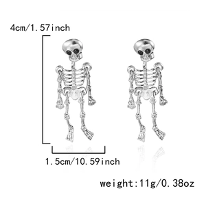 Detailed view of silver skeleton earrings with 4cm height and 1.5cm width measurements