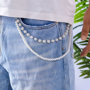 Close-up of double-layer pant chain with white pearls and disco ball diamond beads