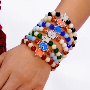 Luminous Halloween beaded bracelet set with pumpkin and ghost charms for party wear