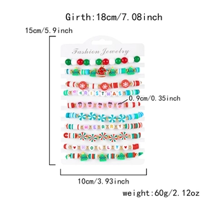 Close-up of 10-piece Christmas bead bracelets with festive trees, snowmen and letter beads