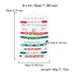Detailed view of 10-piece Christmas clay bead bracelet set with festive charms and charms