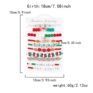 Close-up of 10-piece Christmas beaded bracelet set with festive Santa and snowflake charms