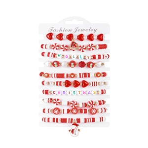 Detail of 10-piece Christmas beaded bracelet set with snowman and Holly lettering