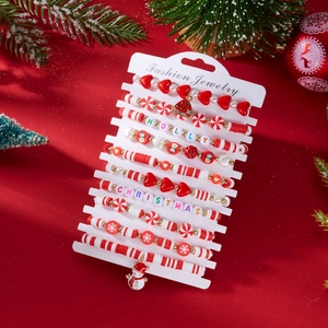 Close-up of 10-piece Christmas bead bracelets with snowman and tree charms