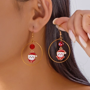 Detailed close-up of Christmas Santa Claus hoop earrings with red crystal bead on model