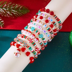 Detail of Christmas beaded bracelet set with snowmen charms and festive letter beads