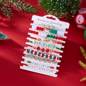 Detailed set of 10 festive Christmas beaded bracelets with Santa and snowflake charms
