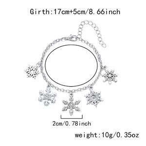 Silver snowflake bracelet with five crystal charms, lobster clasp, and 5cm extension