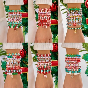 Christmas multilayer beaded bracelet set with Santa and snowflake charms on wrist