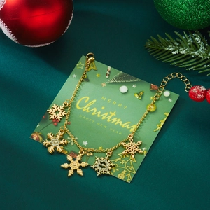 Detailed close-up of golden snowflake pendant necklace with crystals on festive background