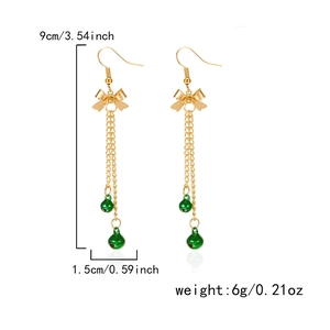 Detail of Christmas bell tassel earrings with dimensions 9cm length and 1.5cm width