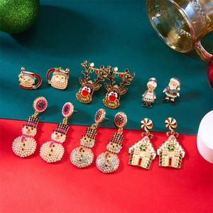 Parure de boucles d'oreilles de Noël avec bonhommes de neige en perles et rennes festifs