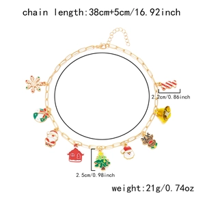 Detail view of festive gold chain necklace with colorful Christmas charms and dimensions