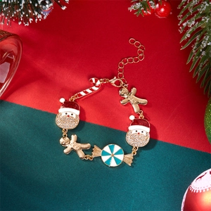 Bracciale natalizio dorato con ciondoli di Babbo Natale, omino di pan di zenzero e bastoncini