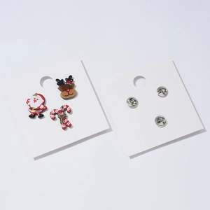 Three-piece Christmas brooch set with Santa, reindeer and candy cane on display card