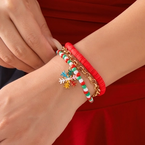 Three-piece Christmas beaded bracelet set with snowflake pendant and festive charms