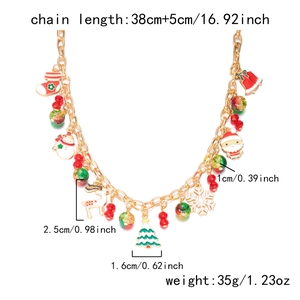 Detailed view of Christmas charm necklace showing weight and dimensions on white backdrop