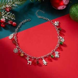 Detailed view of Christmas themed double-layer necklace with elk and tree charms