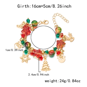 Detailed view of Christmas bracelet with Santa, reindeer and snowflake charms