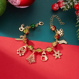 Detailed view of Christmas charm bracelet with Santa, reindeer and colorful beads