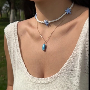 Bohemian double-layer ocean necklace with blue stars, beads, and evil eye pendant