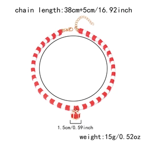 Detailed view of Christmas necklace dimensions with red and white beads and gift box charm