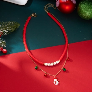 Detail view of a double-layered Christmas necklace with snowman pendant and colorful bells