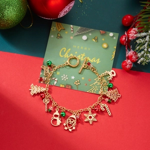 Detailed view of Christmas charm bracelet with Santa, reindeer and tree charms on OT clasp