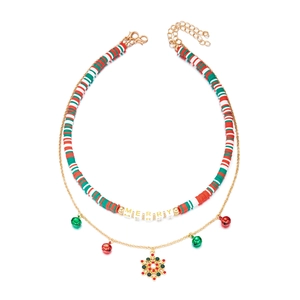 Detail of Christmas double-layer necklace with Merry beads, bells and snowflake pendant