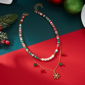 Detail of Christmas double-layer necklace with Merry beads, colorful bells and snowflake pendant
