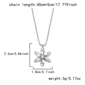 Detail of silver snowflake necklace with dimensions and clear crystal inlay details