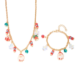 Detail des Weihnachts-Schmucksets mit Weihnachtsmann, Glocken und Sternen an Goldkette