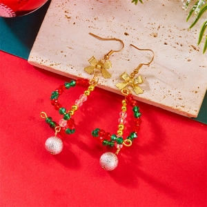 Detailed Christmas drop earrings with red and green beads and a sparkly silver ball