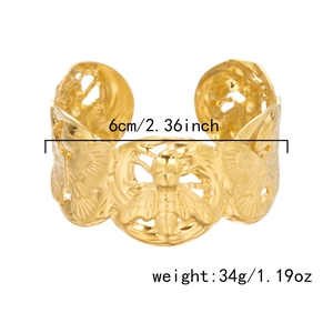 Detail view of gold cuff bracelet with hollow bee pattern, size and weight specifications