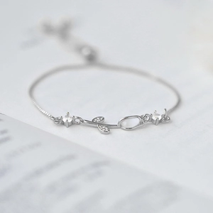 Detail of tulip cat eye stone bracelet with adjustable slider clasp and cubic zirconia